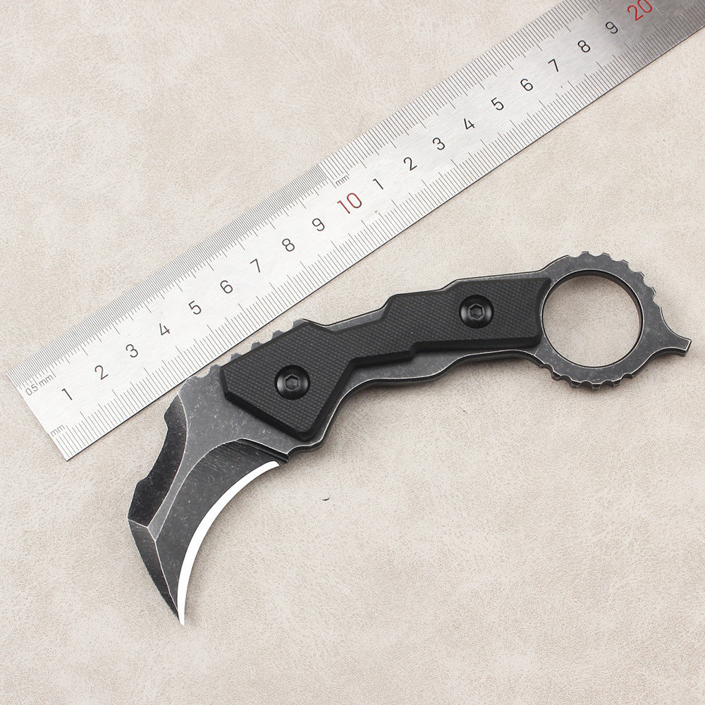 High-quality outdoor and survival knife: portable, high-hardness, sharp, compact—suitable for wilderness use or as an everyday carry fruit knife.