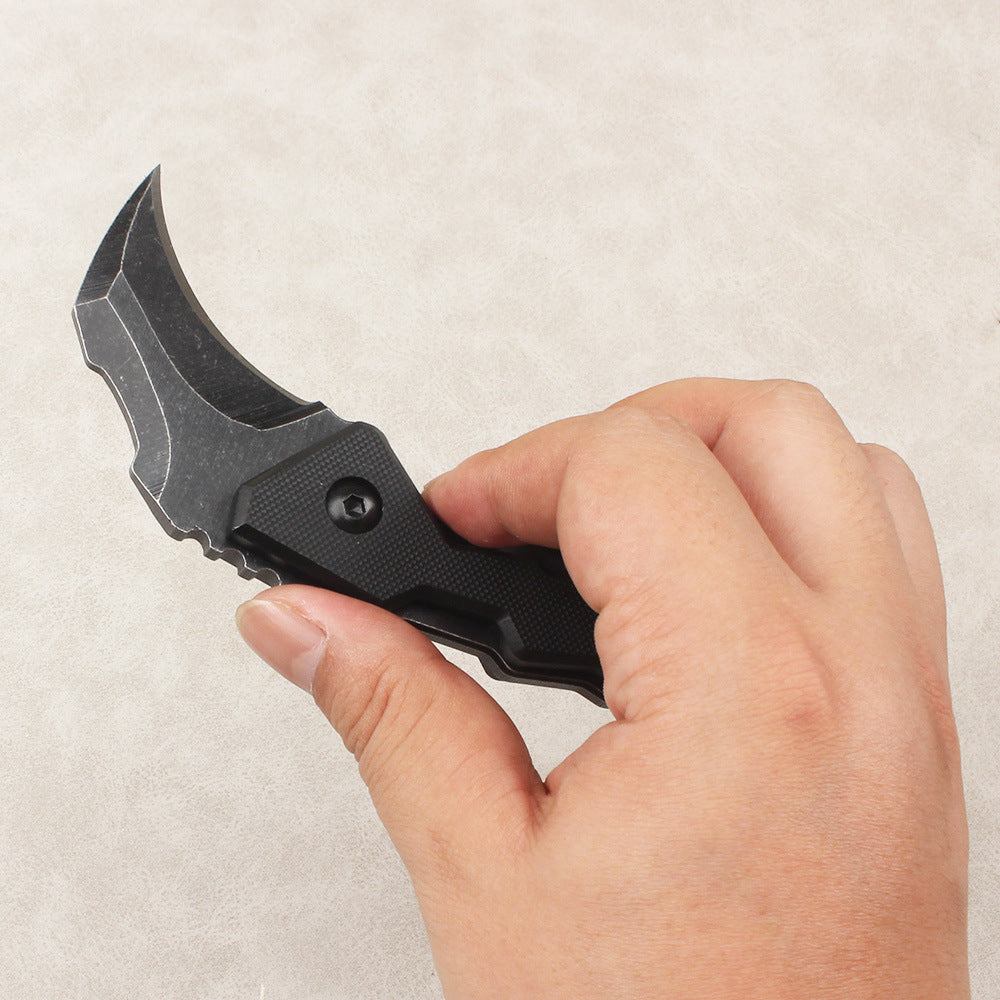 High-quality outdoor and survival knife: portable, high-hardness, sharp, compact—suitable for wilderness use or as an everyday carry fruit knife.